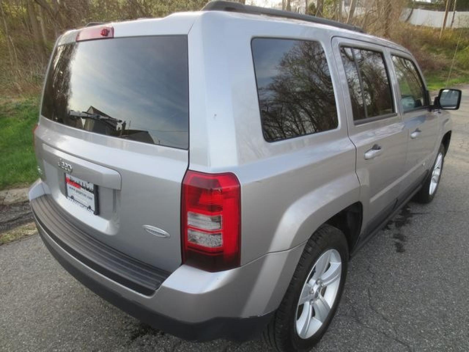 2014 Gray /Black Jeep Patriot Latitude 4WD (1C4NJRFB9ED) with an 2.4L 4cyl engine, Automatic transmission, located at 270 US Route 6, Mahopac, NY, 10541, (845) 621-0895, 41.349022, -73.755280 - Photo #3